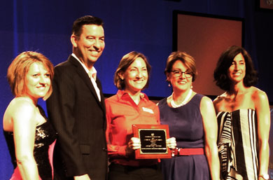 Jamie Belinne, center, receives the 2013 NACE Innovation Excellence in Diversity Programming Award.