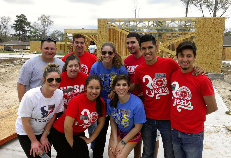 The Hispanic Business Student Association (HBSA) at the C. T. Bauer College of Business at the University of Houston hosts many outreach programs throughout the semester to promote business leadership skills and to give back to the community. Pictured, representatives from the organization during a recent Habitat for Humanity event.