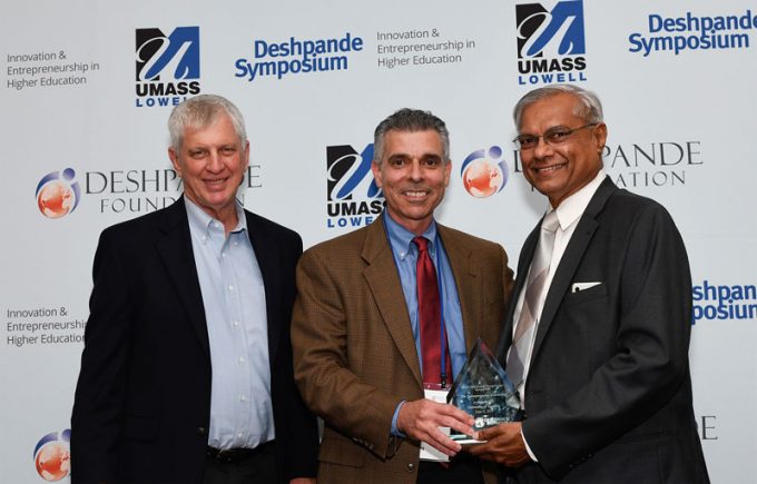 Photo: The University of Houston was honored with The Entrepreneurial University Award by the Deshpande Symposium on June 11. Shown at the awards event are, from left, Jack Wilson, former UMass system president and founder of the Jack M. Wilson Center for Entrepreneurship at UMass Lowell; Bauer College Interim Dean Tom George; and Deshpande Foundation Executive Director Raj Melville. The eighth annual conference, held June 10 through June 12, is presented by UMass Lowell and the Deshpande Foundation.