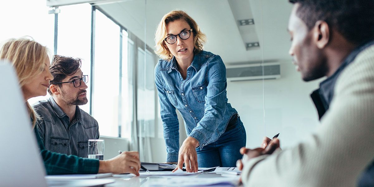Photo of Business Professionals at a Conference Table