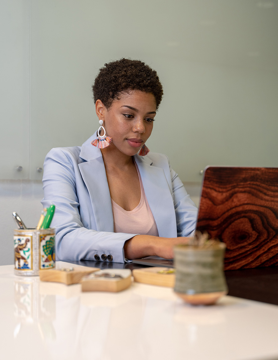 Woman on laptop working