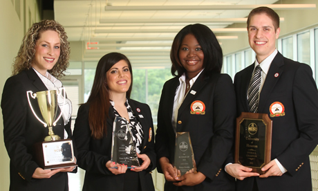 Photo: Students in the Program for Excellence in Selling took home a first place win for the second year in a row at the 2012 National Collegiate Sales Competition. Competitors Grace Moceri (center left) and Sonya Brooks (center right) took home first and second place, sweeping the competition for the first time in University of Houston history, with Bryan Hentges and Markee Johnson as alternates.