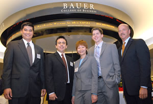 Gold Medal Win. Bauer team's John Keeton, Mauricio Franco, Quyen Nguyen and Joe Corkin with Men's Wearhouse CFO Neill Davis.