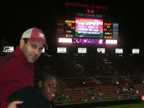 Serving as a “Big” for the Big Brothers Big Sisters organization, C. T. Bauer College of Business at the University of Houston Alumni Sepand Moshiri (GEMBA ’12) spends time with Brendan (right), taking him to UH football games and helping through difficult times in school and his personal life.