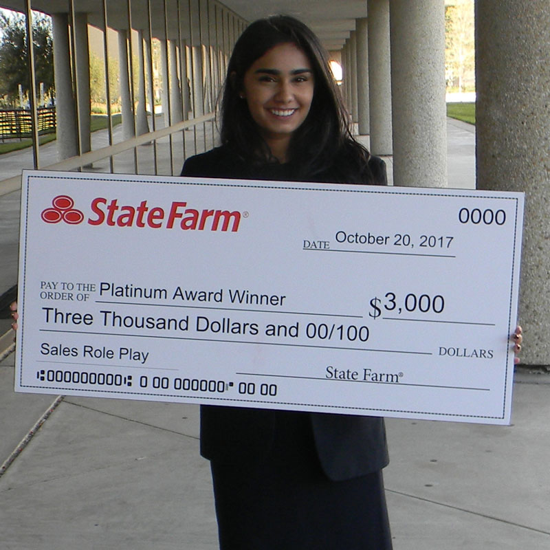 Management senior Ashley Jain and finance and marketing junior Adam Mooney (not pictured) competed against individuals and teams from colleges including University of Central Missouri, Arizona State University, University of Georgia and other leading U.S. business schools, claiming top honors in the State Farm marketing and Sales Competition.