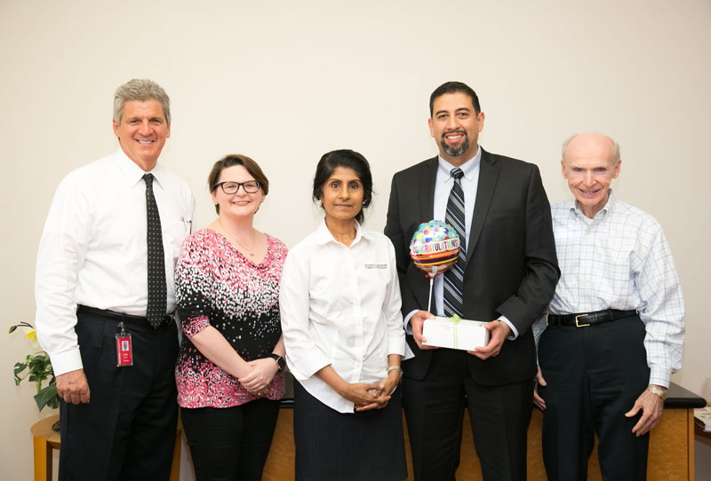 Bauer finance senior Eddie Martinez (second from right) was awarded a $10,000 Deena Jo Heide-Disselin Foundation Scholarship from the CFP® Board Center for Financial Planning.