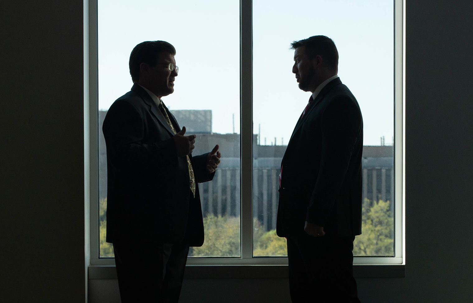 Photo: Executives Talking in Conference Room