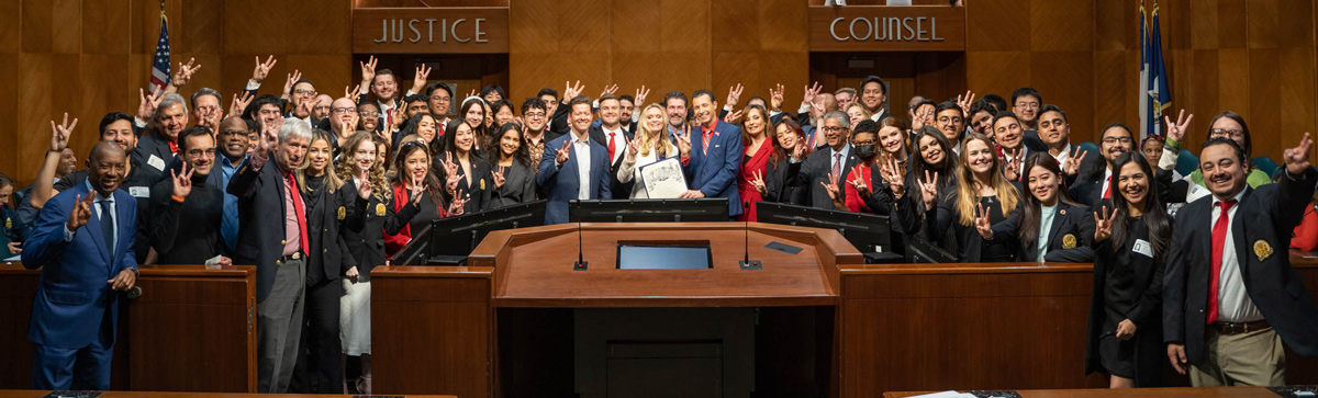 Photo: UH Bauer College of Business students, professors, supporters and representatives from Intel gather for a photo in the City of Houston City Council chamber after the proclamation.